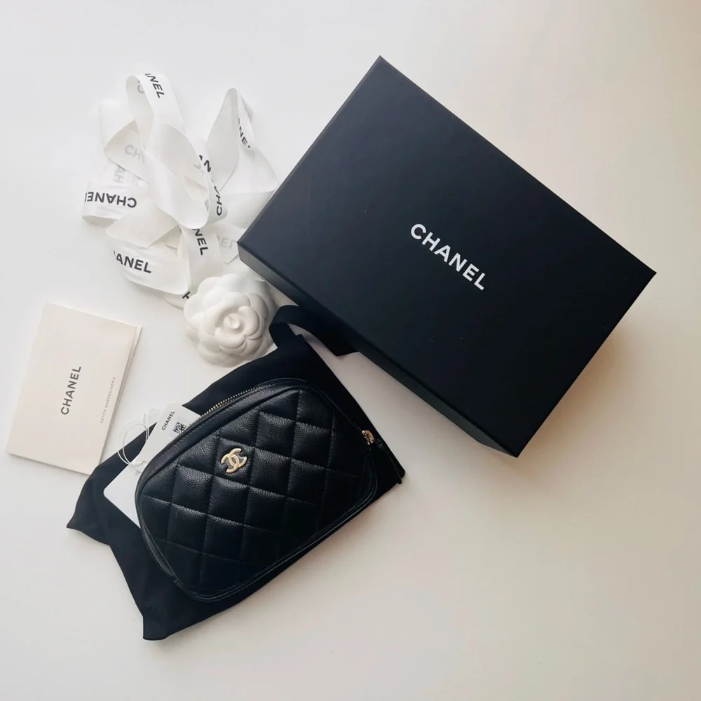 CHANEL Black Quilted Leather Cosmetic Pouch with Gold CC Logo